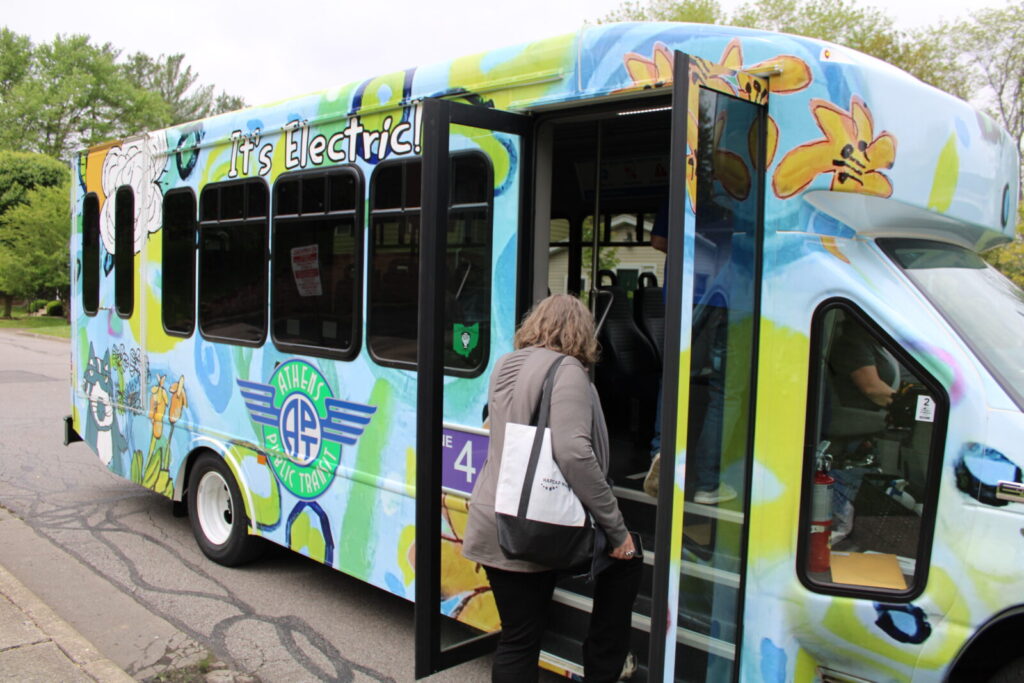 Woman getting onto Athens Public Transit bus