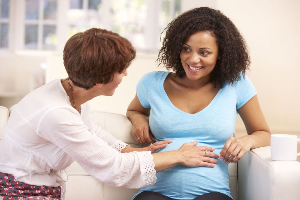 photo of a Doula and a pregnant woman