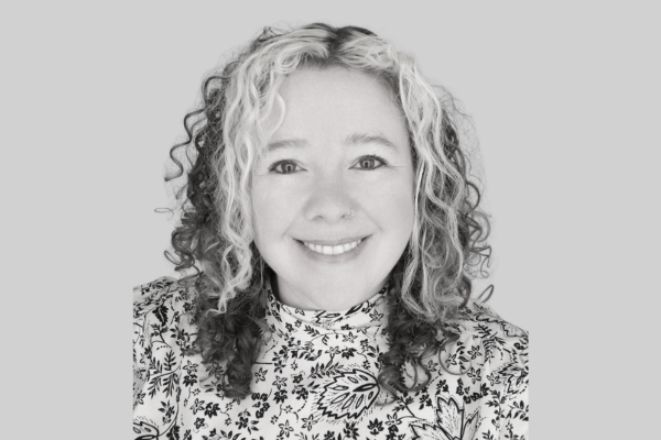 black and white headshot photo of Alicia