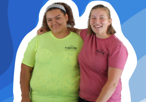 Photo of Amy and a CCMEP participant in HAPCAP shirts