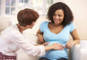 photo of a Doula and a pregnant woman